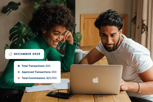 A woman and young man look at a laptop together with pensive, but positive expressions with popups about recent transaction data