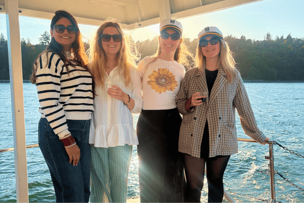 A group of women on a boat in the water