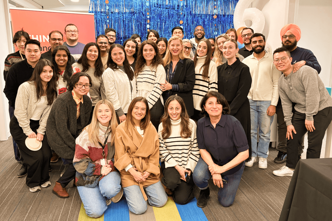 A group photo of the Fintel Connect team during their 6th year anniversary