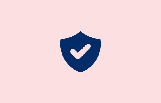 Icon representing compliance and trust — shield with checkmark symbol.